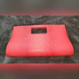 Tangerine embossed faux leather clutch